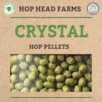 Image showing the label for "Crystal Hop Pellets" from Hop Head Farms. The label features a close-up image of green hop pellets, with logos of Hop Head Farms and the State of Michigan Seal.