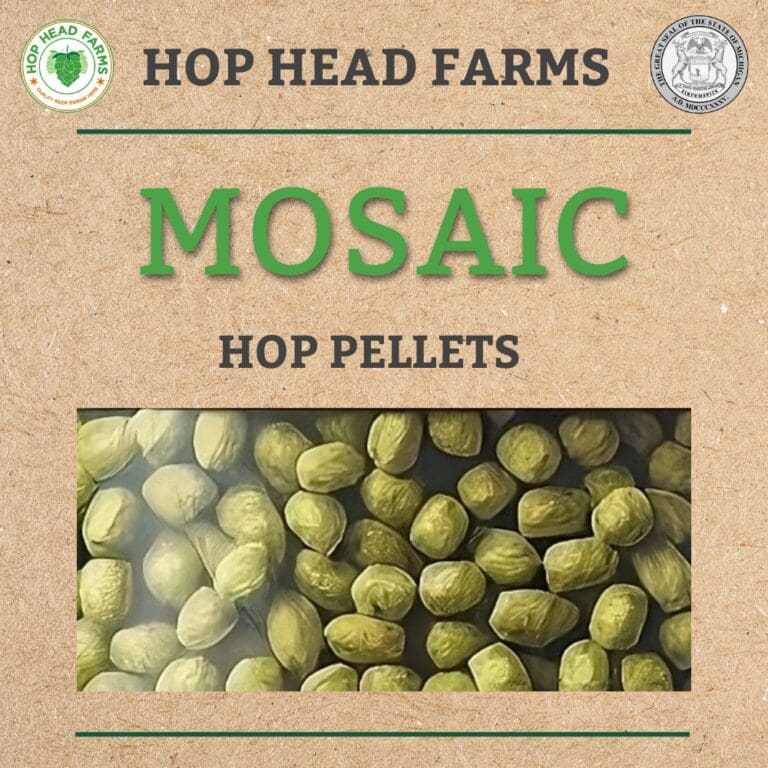 A close-up of green hop pellets with text "Hop Head Farms" and "Mosaic Hop Pellets" displayed on brown cardboard-like background.