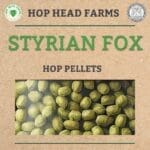 A labeled package of Styrian Fox hop pellets from Hop Head Farms. The top section features the company logo and the text "Hop Head Farms," while the bottom showcases an image of the hop pellets.