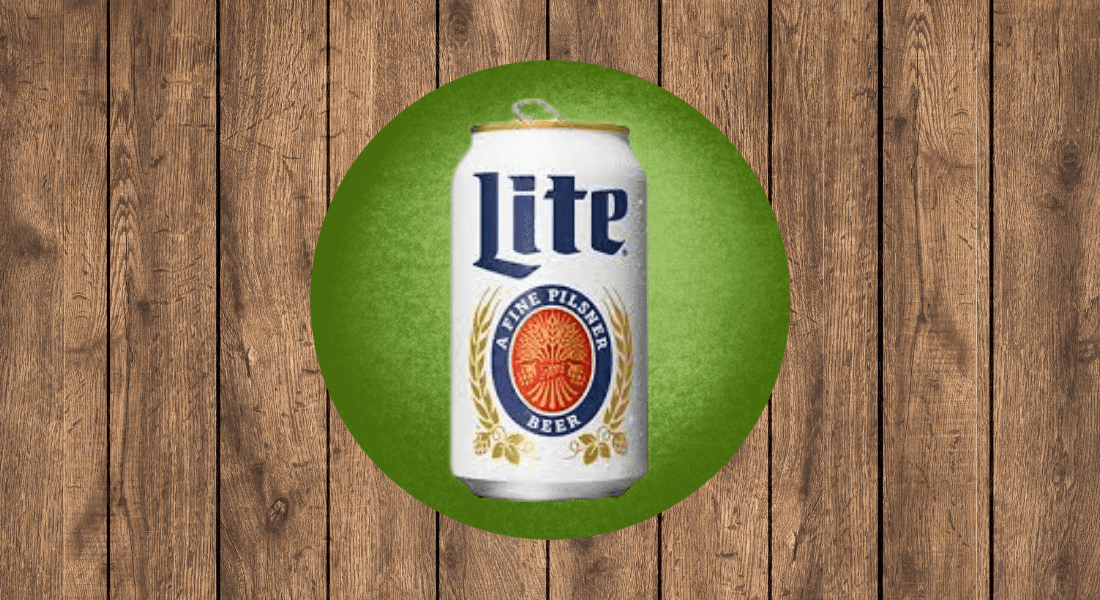 A can of Lite beer with a green circle background, set against a wooden surface.